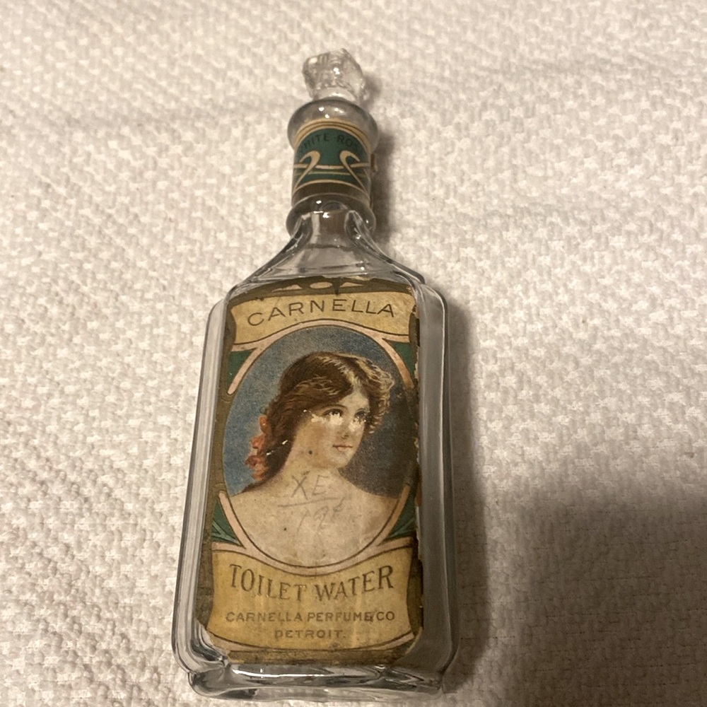 1914 Carmella Toilet water bottle with revenue stamp. RARE